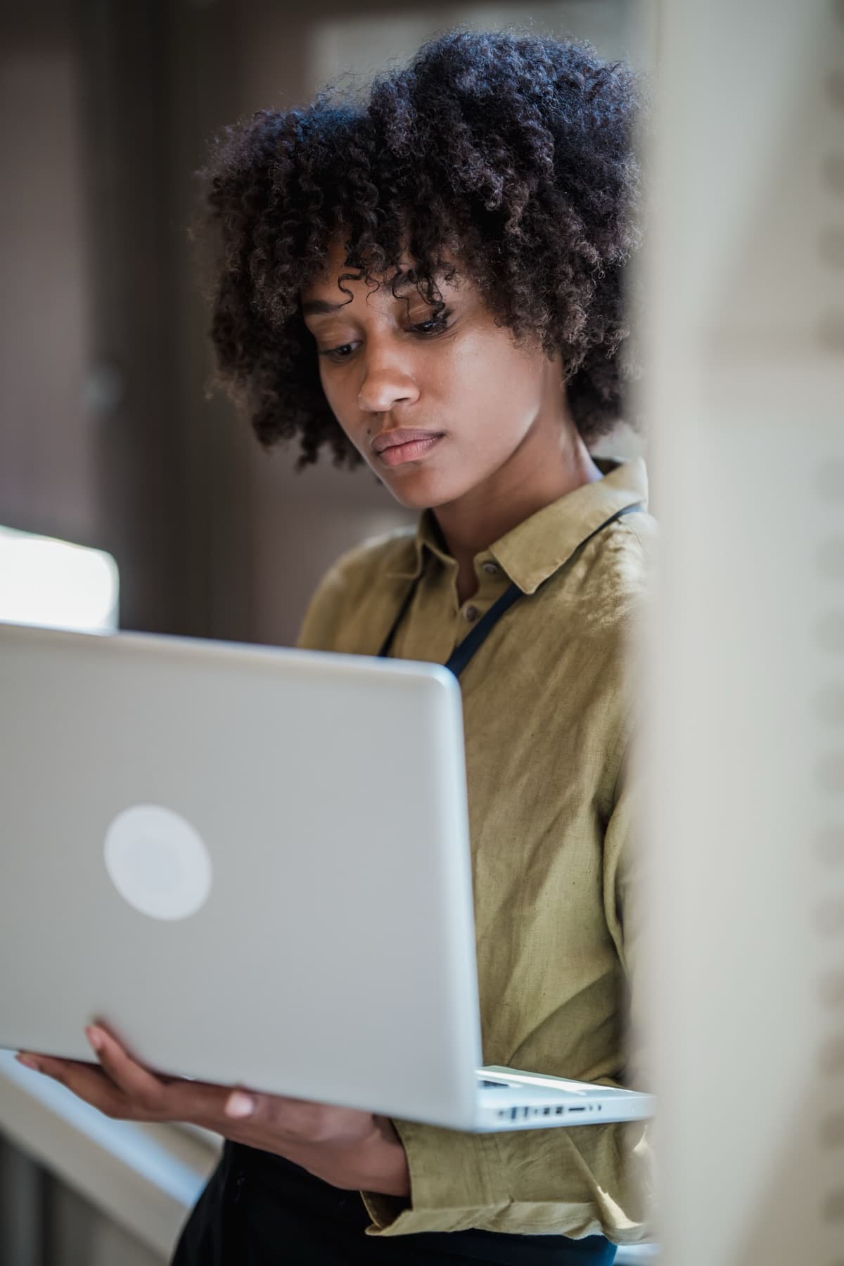 An employee reviewing information on a company laptop